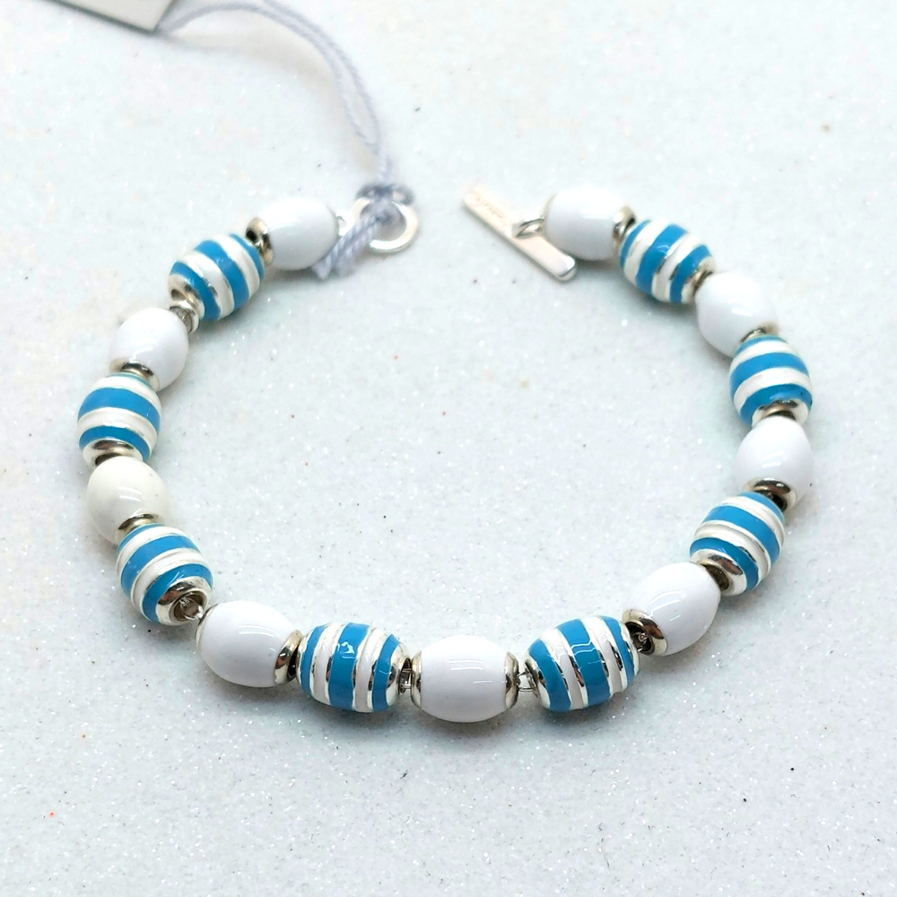 20220714_114934.jpg Bracciale Conchiglie Grandi Bianche e Bicolore Donna Dodo Mariani - immagine 1