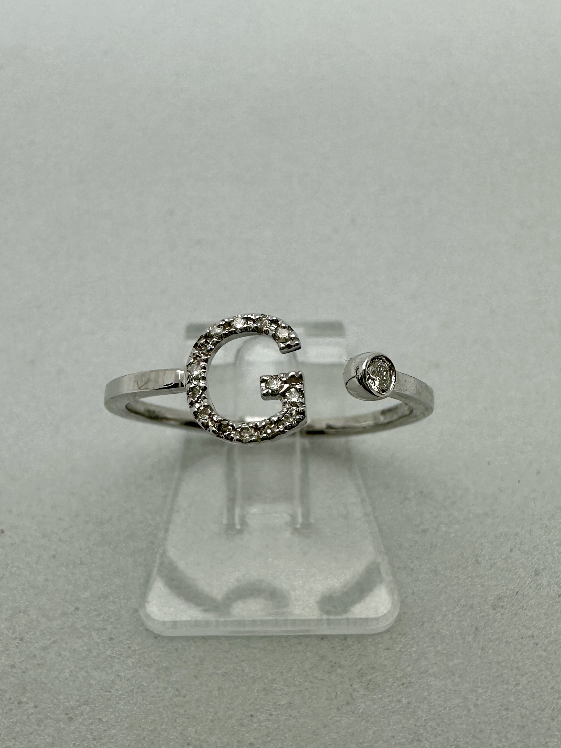 Anello-lettera-G-lucciole.jpg Anello in Oro 18kt con Lettera G in Diamanti - Lucciole - immagine 1